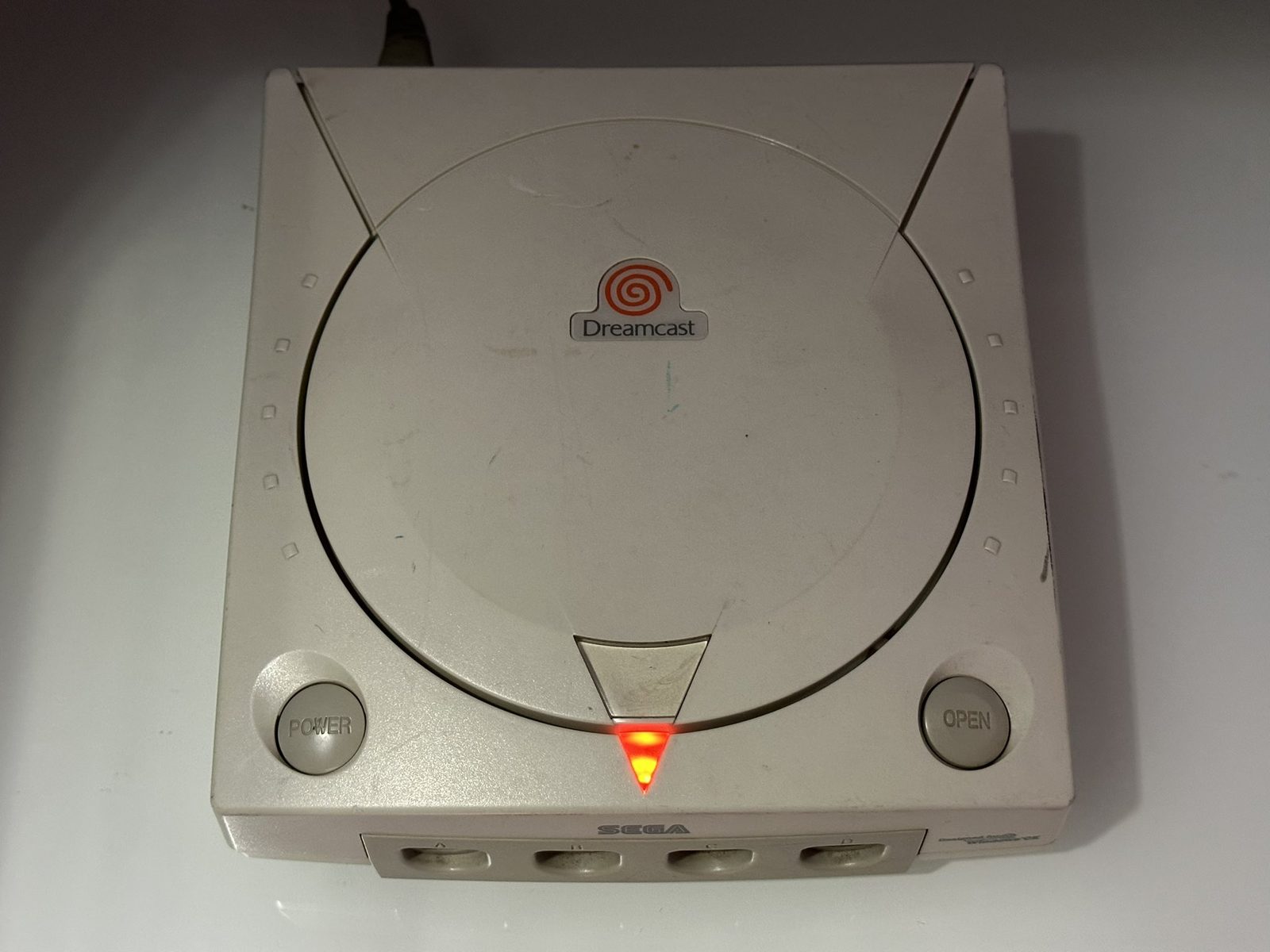 Inside the Dreamcast after a first clean — capacitors in good shape, minimal dust.