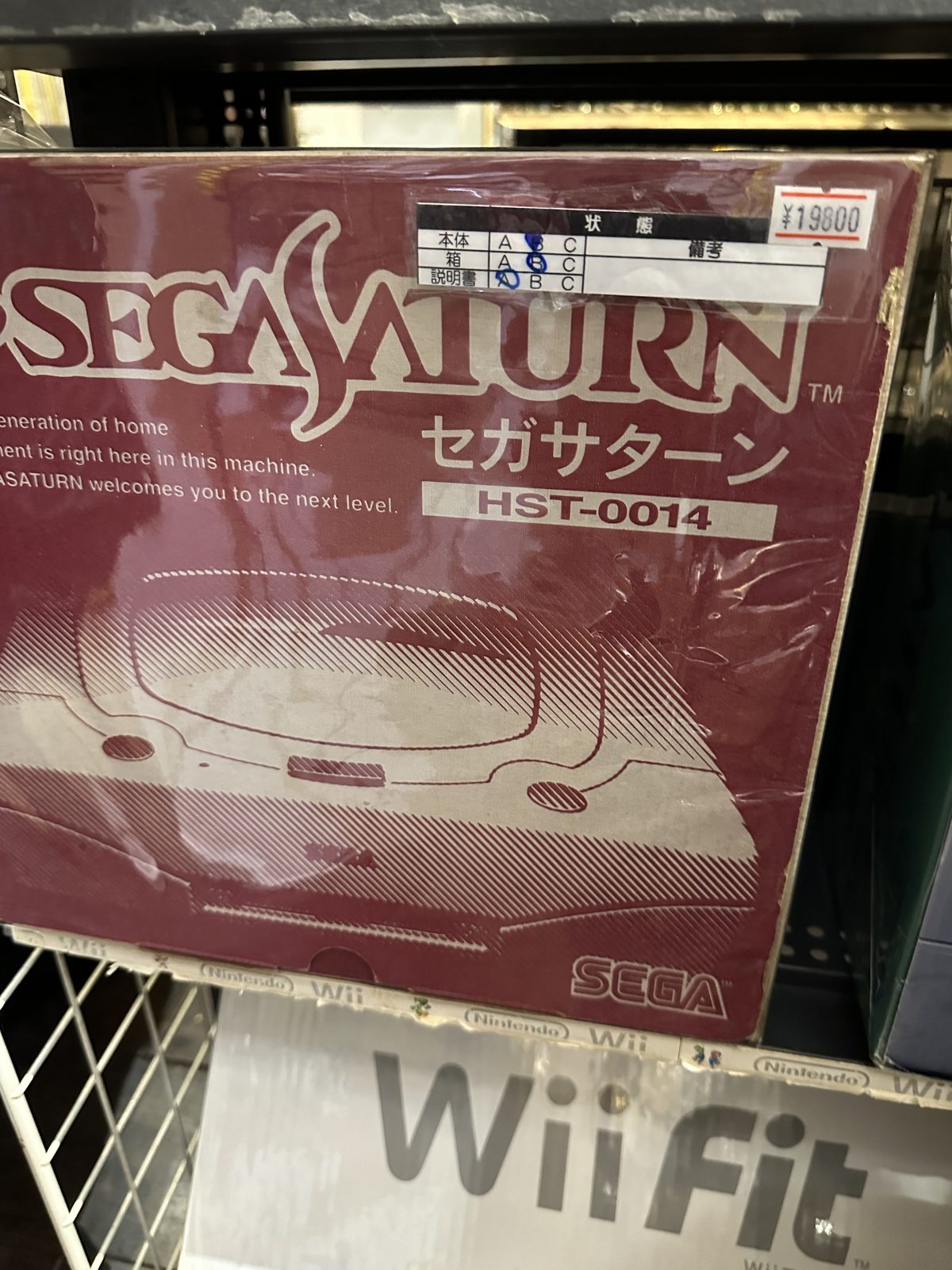 A boxed Sega Saturn at Retro Game Camp, priced at ¥19,800