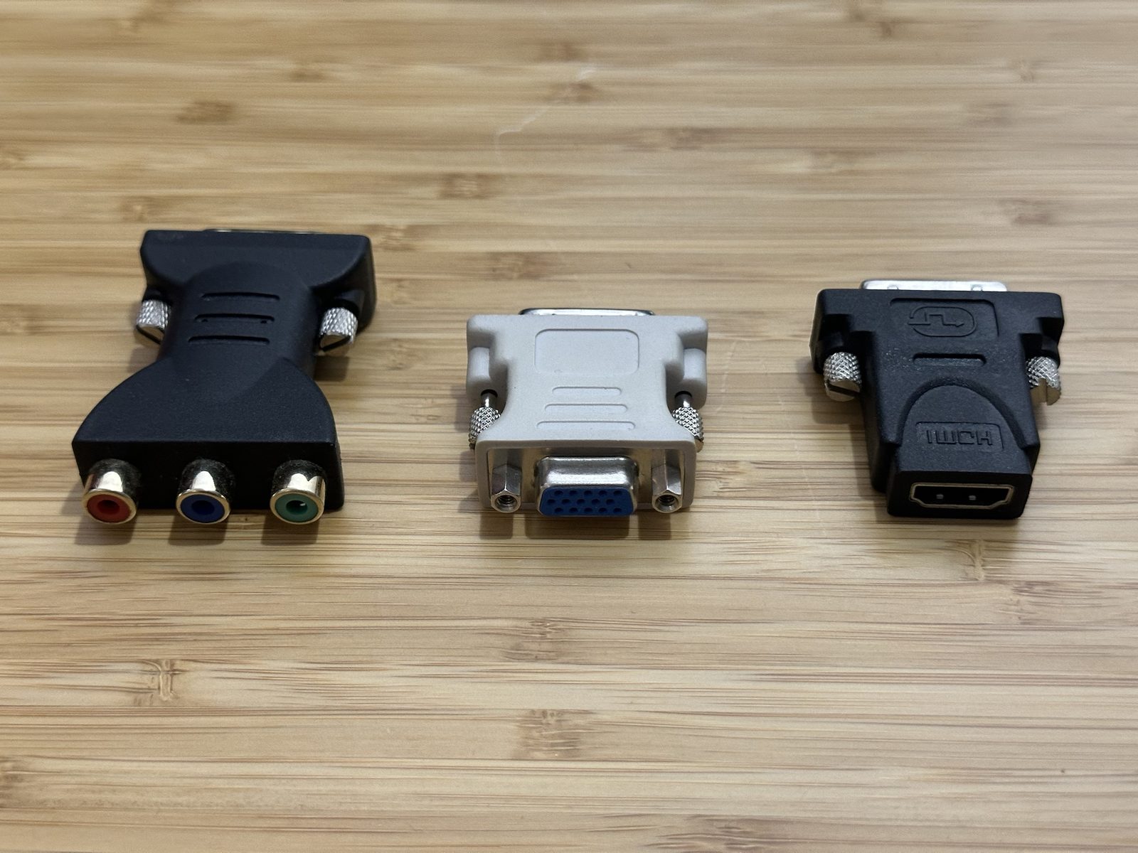 Component, VGA, and HDMI adapters for a DVI-I input