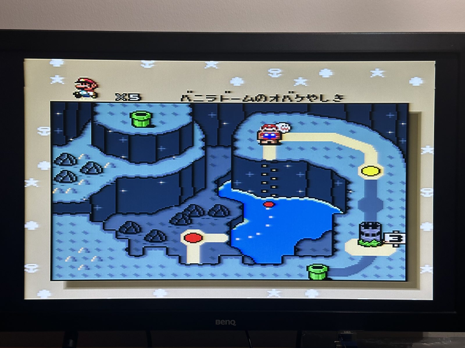 A Japanese Super Mario World cartridge running on the same setup