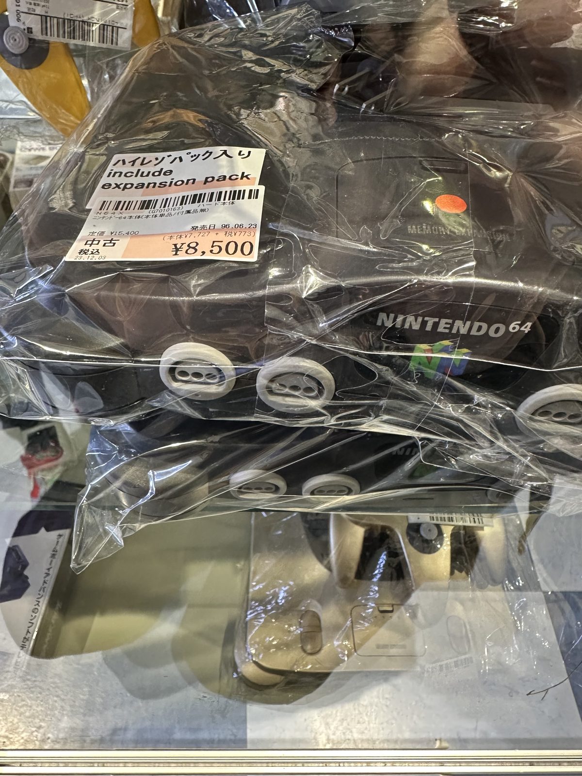 A used Nintendo 64 with Expansion Pak at Surugaya Shinjuku, priced at ¥8,500